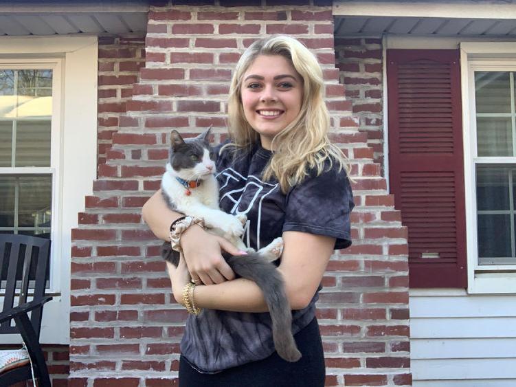 Christianna Kile holding her cat. 